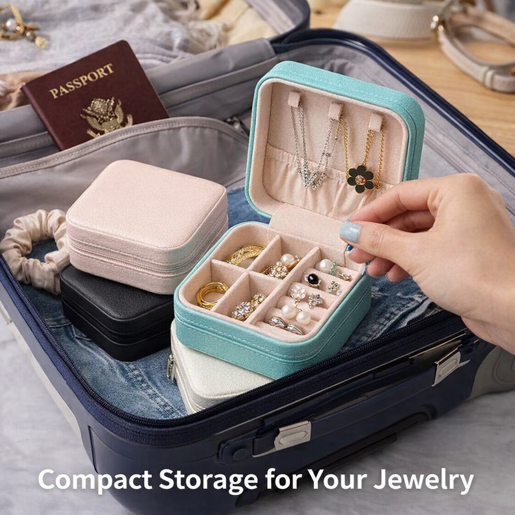 AI Product Builder image Lifestyle image of stacked small square jewelry boxes in pastel colors closed with zipper on marble surface